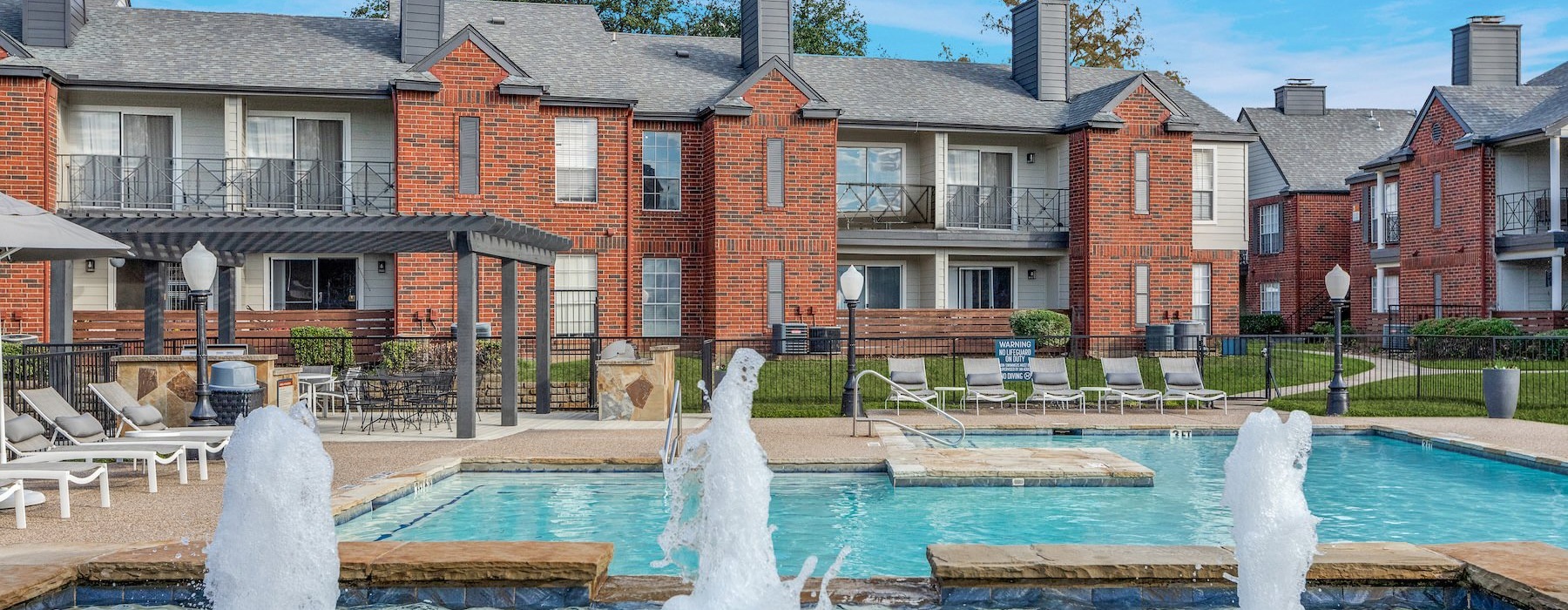 a fountain in a pool