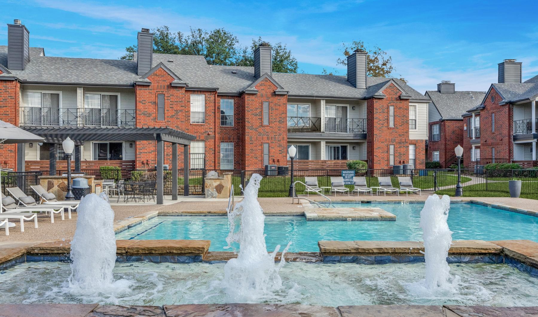 a fountain in a pool