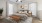 a bedroom with a bed and a fan