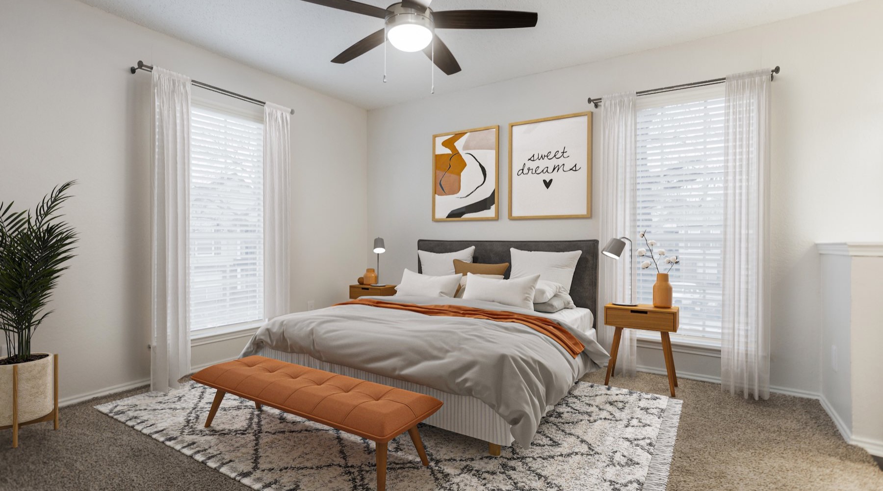 a bedroom with a bed and windows