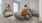 a bedroom with a bed and a fan